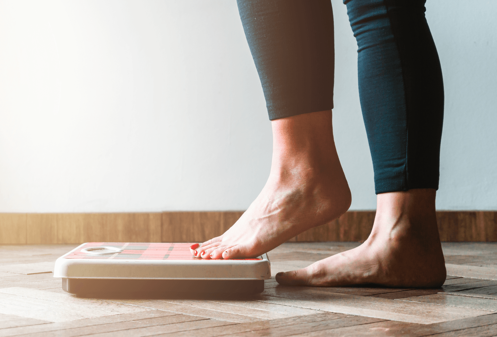 lady stepping on scales