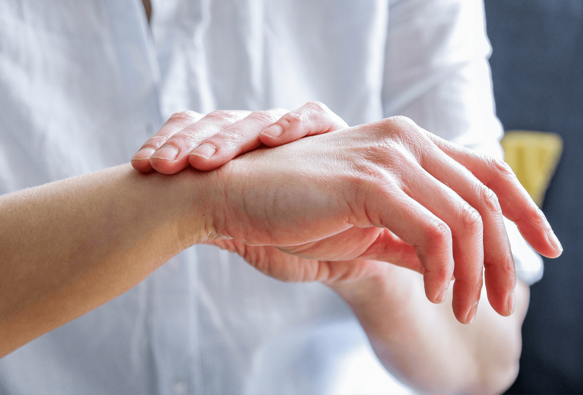 person putting cream on hands