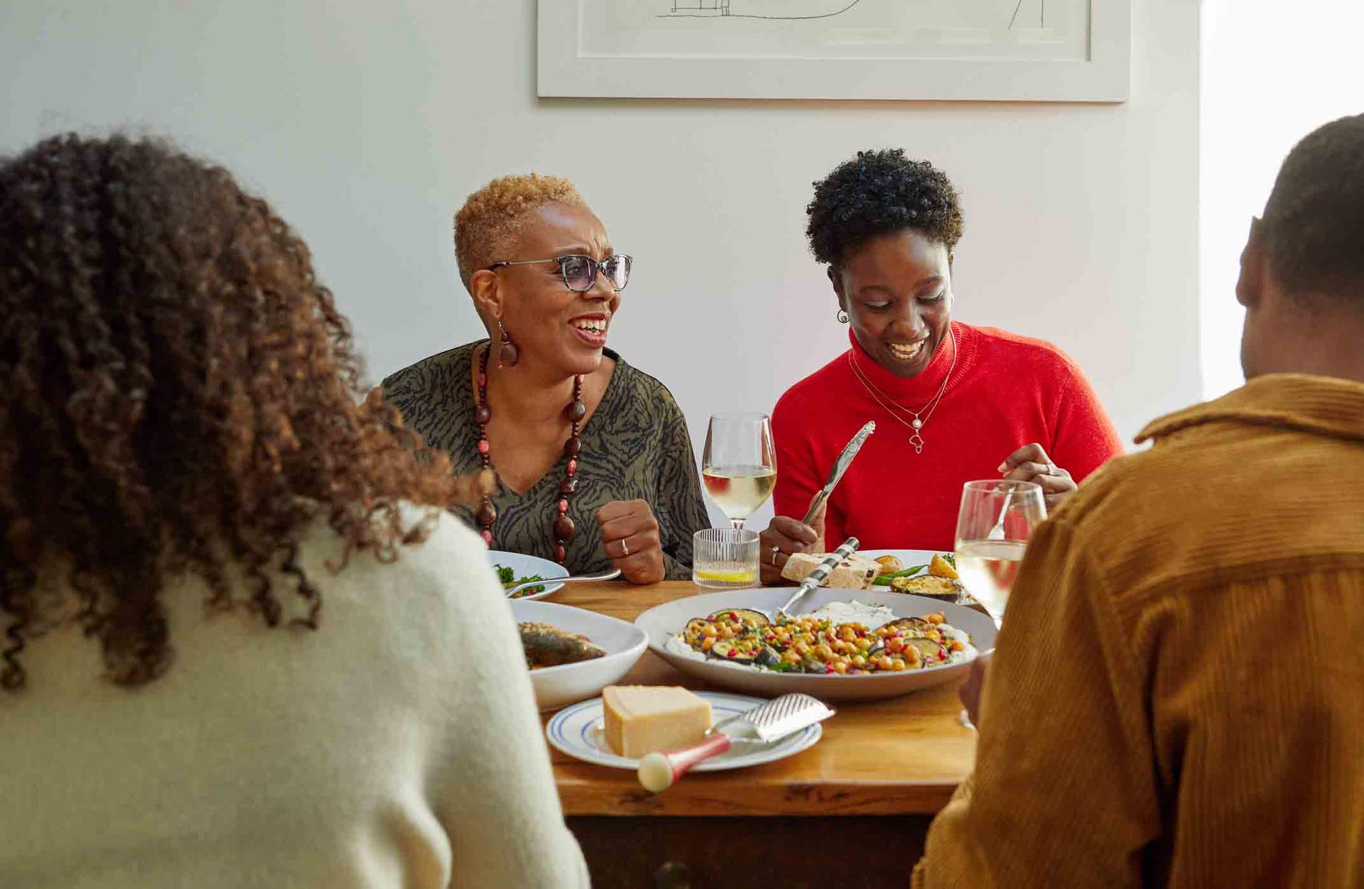 A family enjoying a large dinner